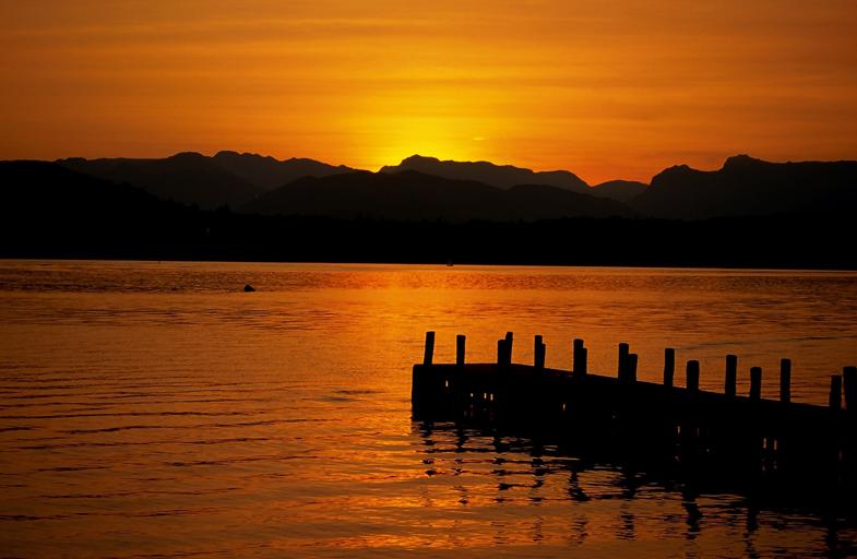 The Langdale Skyline at Sunset Across Windermere